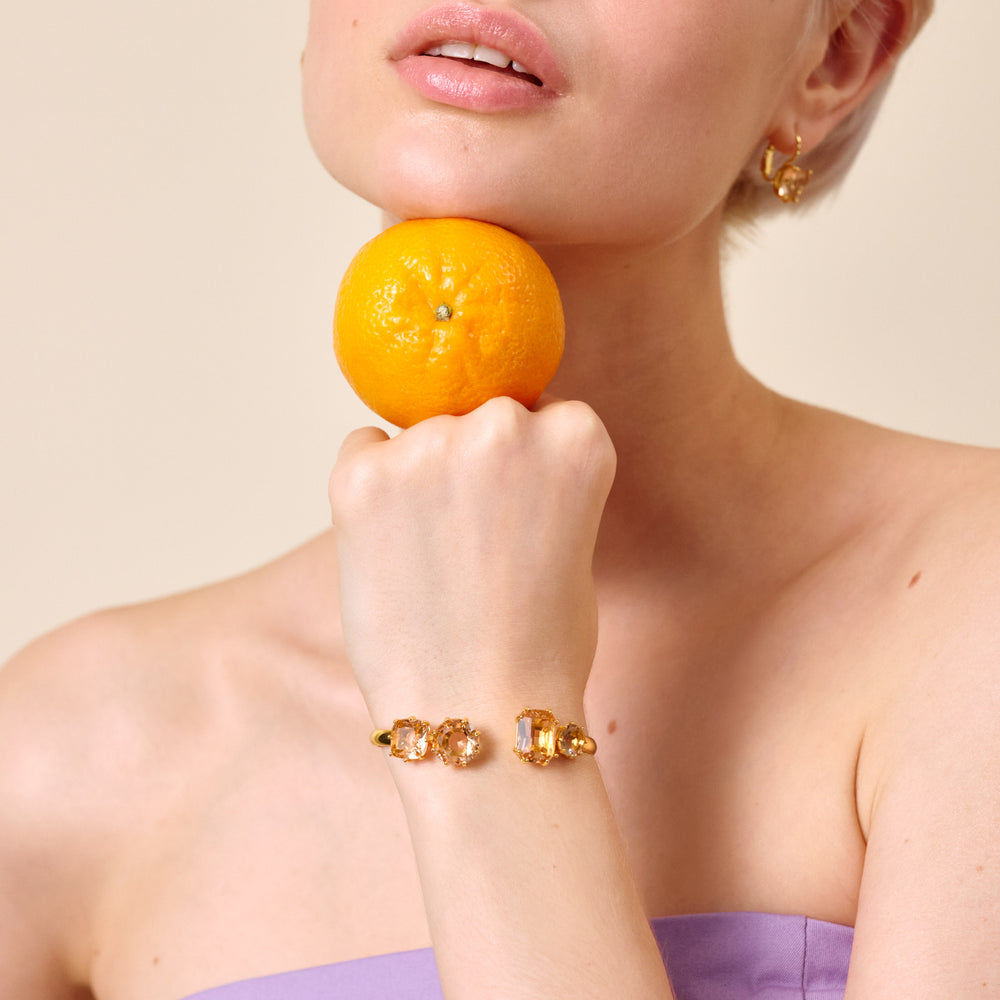 
            
                Load image into Gallery viewer, Apricot Pink Diamantine 4 Stone Bangle Bracelet
            
        