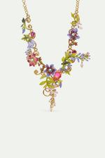 Statement Necklace with Pink and Purple Wisteria on a Golden Arabesque, Adorned with Ivy and Dangling Faceted Pink Crystal Beads