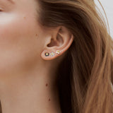 Single Earring with a Black Flower and a Faceted Stone