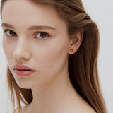 Single Earring with a Purple Flower and a Faceted Stone