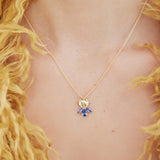 Golden Iris and Blue Stone Pendant Necklace
