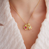 Pendant Necklace with Gold Mona Lisa Roses and Round Stones