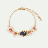 Bracelet with Blue Faceted Stone, Gold Snake and Mallow Flowers