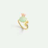 Adjustable Ring with Green Faceted Stone, Pink Hellebore and Gold Dragonfly