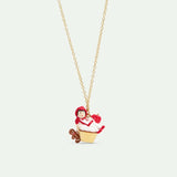 Pendant Necklace with Little Red Riding Hood on a Cupcake and Gingerbread Man